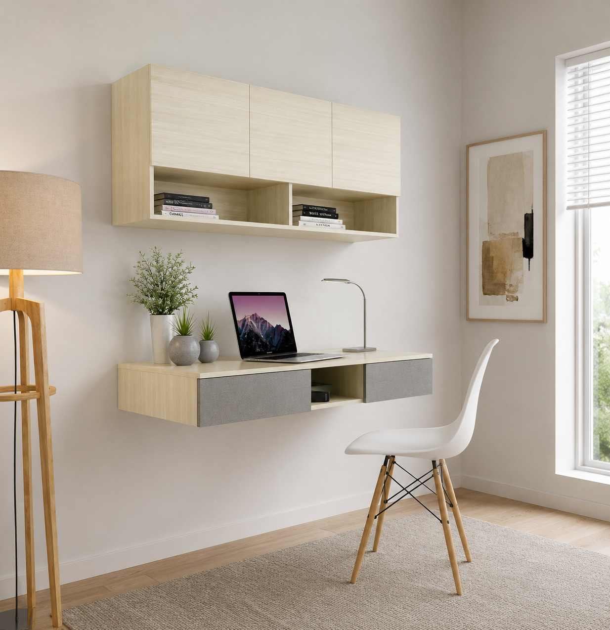 A modern floating desk setup in a bright room, featuring a light wood and gray wall-mounted desk with a laptop, lamp, and small plants, paired with a white chair with wooden legs.