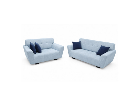 A light blue upholstered loveseat and matching sofa set with dark navy accent pillows, shown on a plain white background.