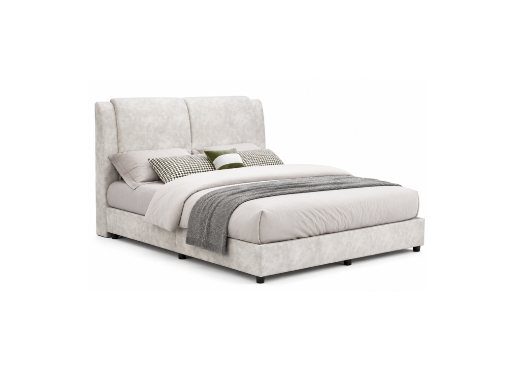 A modern upholstered bed frame in a light gray textured fabric, styled with white bedding, patterned accent pillows, and a gray throw blanket, shown against a plain white background.