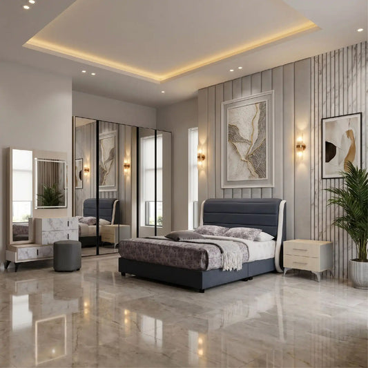 A professionally styled master bedroom featuring the Kove collection in a high-end interior with vertical wall paneling and marble accents. The scene displays the dark blue Helen bed frame, an expansive mirrored wardrobe, a white marble-patterned vanity with LED lighting, and a matching two-drawer nightstand.
