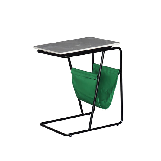 Small table with a green bag underneath on a white background