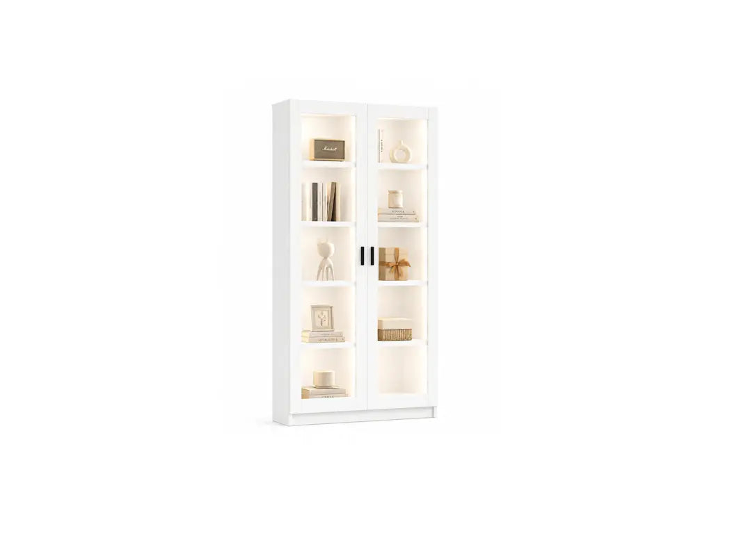 A tall white two-door display cabinet with glass doors and built-in warm lighting, shown against a plain white background with decorative objects inside.