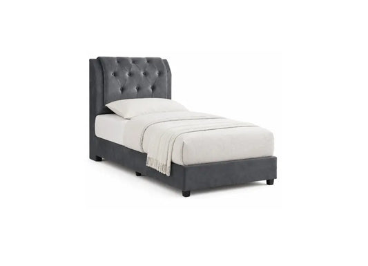 A dark gray upholstered bed frame with a tall button-tufted headboard, shown with white bedding and a light beige throw blanket on a plain white background.