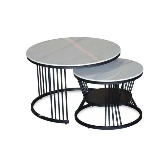 Set of two round marble tables with black metal bases on a white background