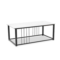 Coffee table with white top and black metal frame on a white background
