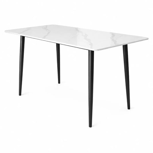 A rectangular dining table with a white marble-look top featuring subtle gray veining and slim black tapered legs, shown on a plain white background.
