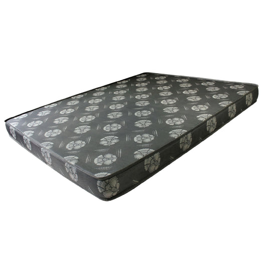 Black mattress with white floral pattern on a white background