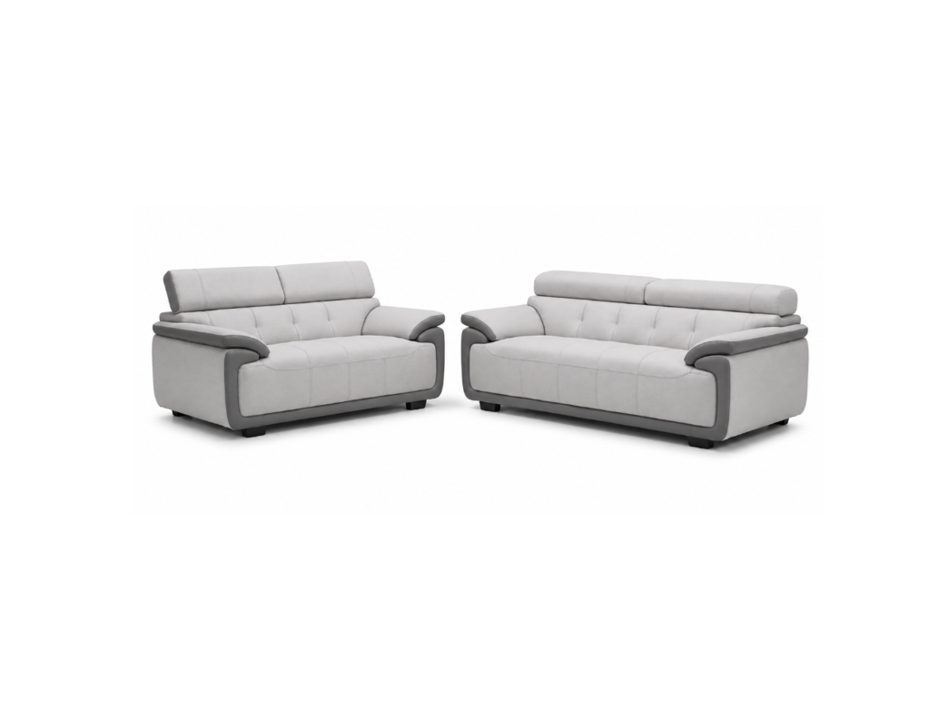 A light gray two-piece sofa set consisting of a loveseat and a matching three-seat sofa, both featuring dark gray armrests and trim, shown on a plain white background.