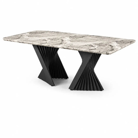 A modern rectangular dining table with a gray and white marbled top and sculptural black pleated metal pedestal bases, shown on a plain white background.