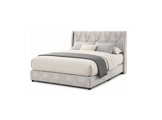 A modern platform bed with a tall, tufted wingback headboard and upholstered base in light gray fabric, styled with cream bedding, gray pillows, and a dark gray throw blanket, shown on a solid white background.
