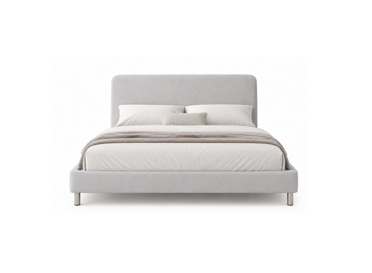 A modern platform bed with a light gray upholstered frame and headboard, styled with white bedding, a beige throw blanket, and two pillows, set against a plain white background.