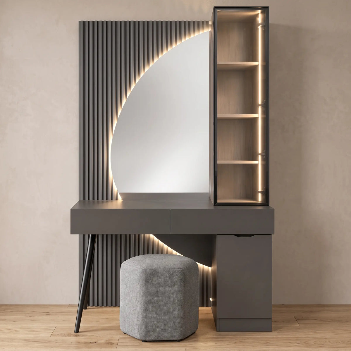 A modern gray vanity table set with a large backlit oval mirror, an open shelving unit on the right, and a round gray stool, shown against a textured beige wall and light wood floor.