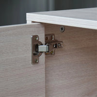 Wooden cabinet with a hinge on a neutral background