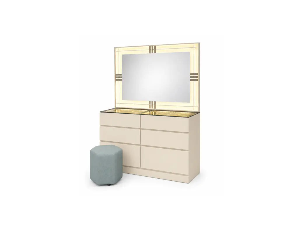 A modern vanity table set featuring a cream-colored three-drawer dresser with a matching backlit mirror, a gold-trimmed top, and a small gray-green cylindrical stool, shown on a plain white background.