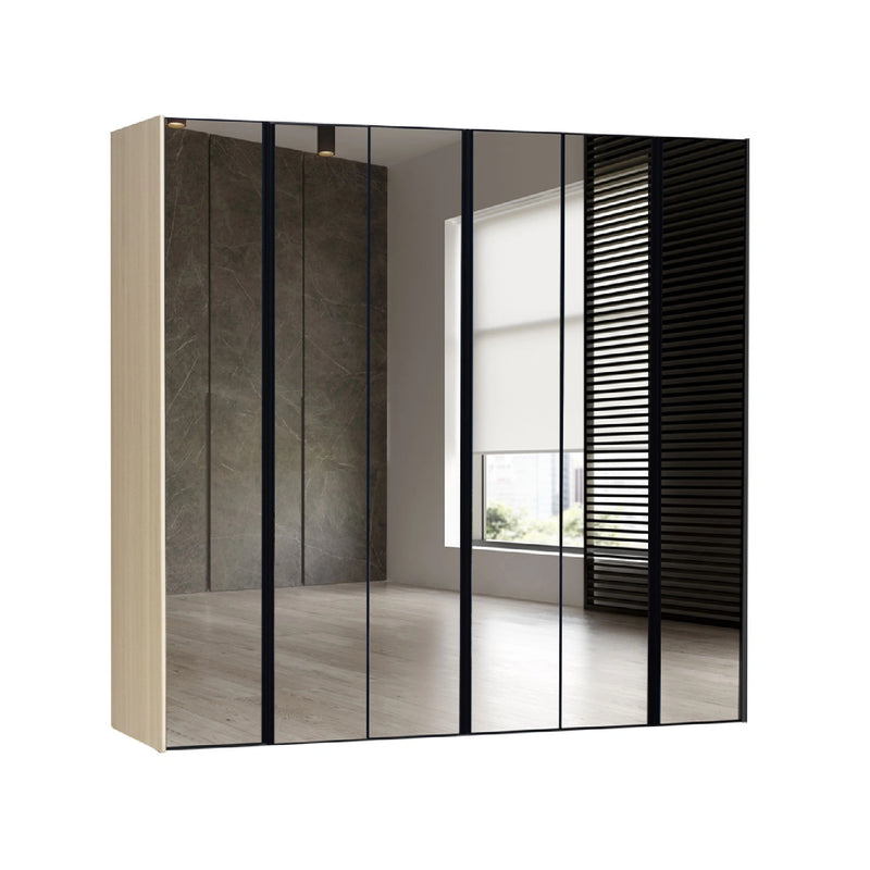 Modern wardrobe with sliding doors in a room with a window.