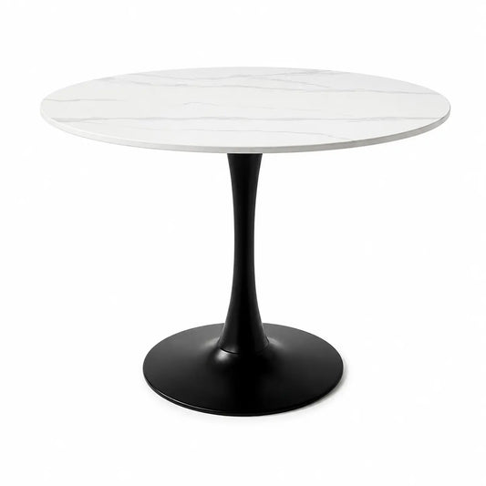 A modern round dining table with a white marble-look top featuring subtle gray veining and a sleek black tulip base, shown on a solid white background.