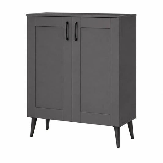 A dark gray two-door cabinet with black handles and tapered black legs, shown on a plain white background.