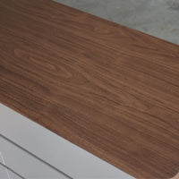 Close-up of a wooden surface with a blurred background