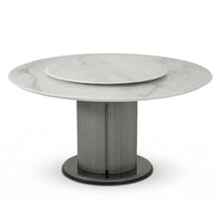 Round marble table with a metallic base on a white background