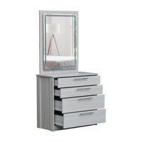 Dresser with mirror and four drawers on a white background