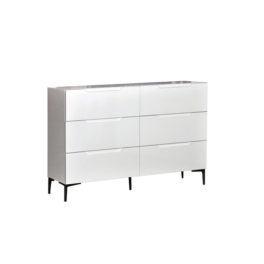 White dresser with four drawers on a white background
