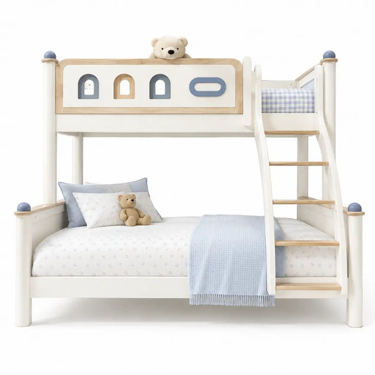 White wooden bunk bed with light natural wood accents, including the headboard panel with arch-shaped cutouts and the ladder. The bed is styled with white and blue bedding, pillows, a teddy bear, and a blue gingham throw blanket, set against a plain white background.