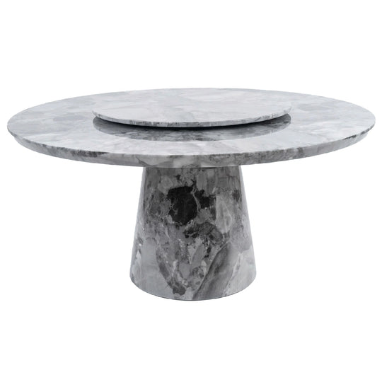Marble dining table with a unique base design on a white background