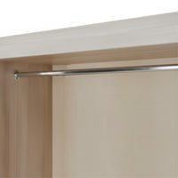 Closet rod mounted on a wooden wardrobe with a white background