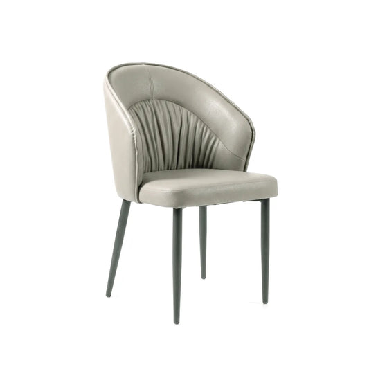 A modern accent chair with a light gray upholstered seat and curved backrest featuring vertical channel tufting, supported by four slim dark gray legs, shown against