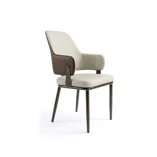 Three-quarter view of a brown and cream leather dining armchair