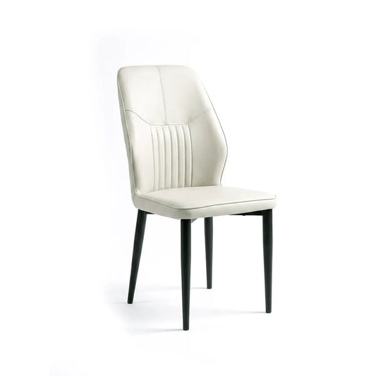 An off-white upholstered dining chair with a high back, vertical channel tufting on the backrest, and four tapered black legs, shown against