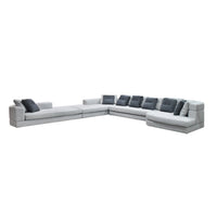 Gray sectional sofa with dark cushions