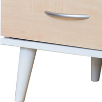 Close-up of a wooden drawer with a white base on a white background