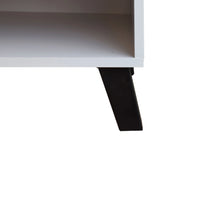 Close-up of a white shelf with a black metal bracket on a white background