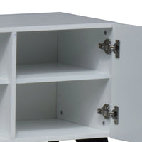White corner cabinet with open door on a white background