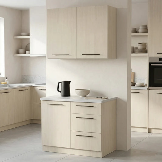 A modern kitchen scene featuring light beige wood cabinetry with a white countertop, including upper wall cabinets, lower base cabinets, drawers, open shelving, and built-in appliances