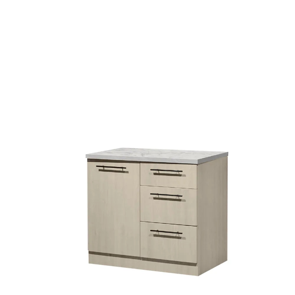 A compact bathroom vanity cabinet with a light beige wood-grain finish, featuring a white marble-look top, a left-side cabinet door, and three stacked drawers on the right, each with a dark metal bar handle.