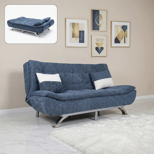 Blue sofa bed in a room with framed art on the wall