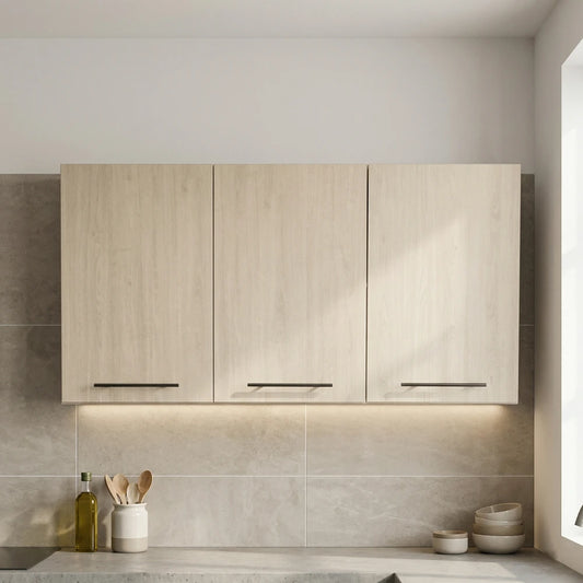 Three light wood kitchen wall cabinets with slim black handles, installed above a tiled backsplash on a kitchen countertop.
