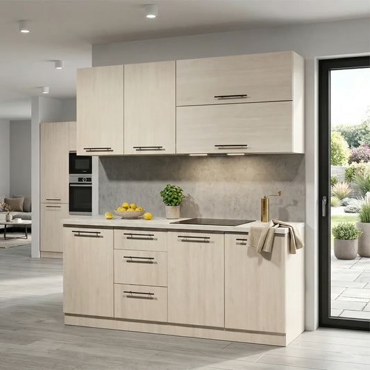 A modern kitchen island with light wood cabinets, a gray stone backsplash, a built-in sink, and a gold faucet, shown in a bright interior with a glass door leading to a garden
