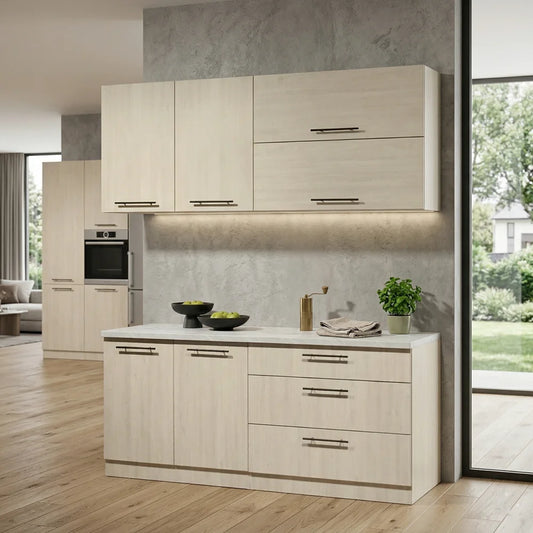 Light wood kitchen cabinets with a modern design, featuring a lower cabinet island with drawers and a matching upper wall cabinet set, set against a textured gray concrete-look backsplash in a bright kitchen